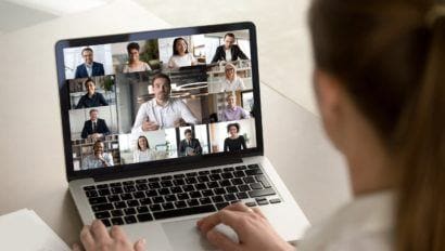 woman on a video call look at laptop